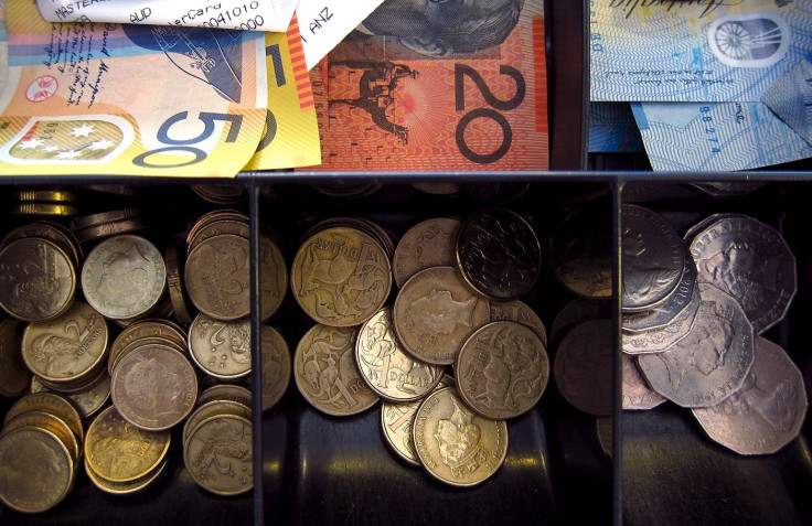 Australian dollar notes and coins can be seen in a cash register at a store in Sydney, Australia, February 11, 2016.