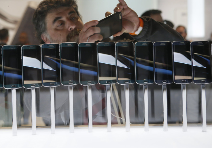 A row of Galaxy S6 edge smartphones are seen on display at the Samsung Galaxy Unpacked event before the Mobile World Congress in Barcelona March 1, 2015. 