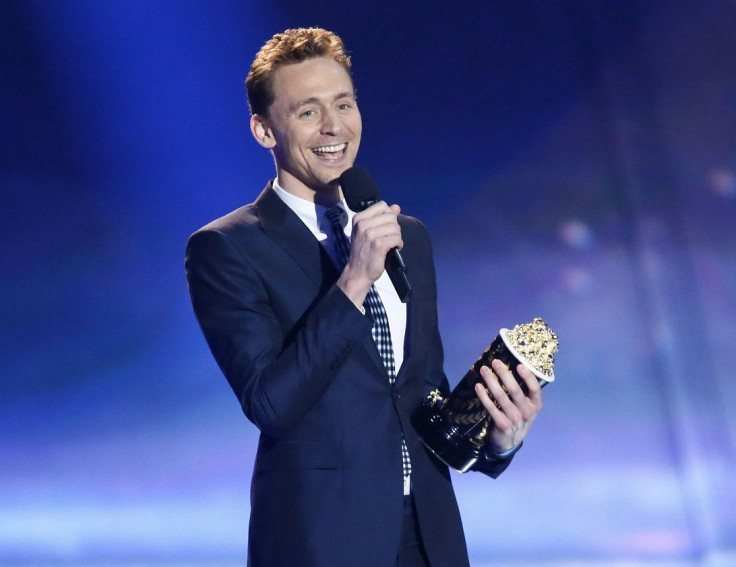Actor Tom  Hiddleston accepts the award for best villain for "The Avengers" at the 2013 MTV Movie Awards in Culver City, California April 14, 2013.