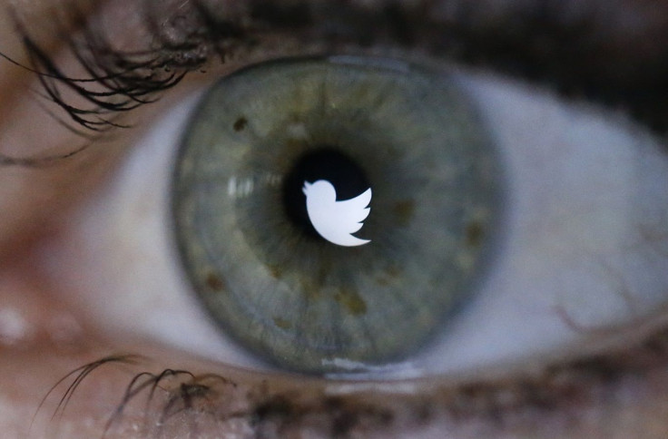 RTX153N0An illustration picture shows the Twitter logo reflected in the eye of a woman in Berlin, November 7, 2013.