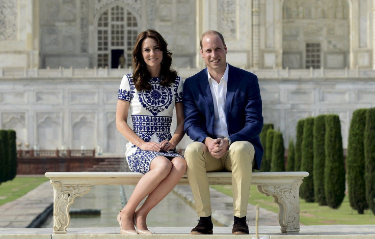Britain's Prince William and his wife Catherine, the Duchess of Cambridge, pose as they sit in front of the Taj Mahal in Agra, India, April 16, 2016.