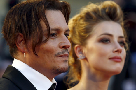Actress Amber Heard and her husband Johnny Depp 