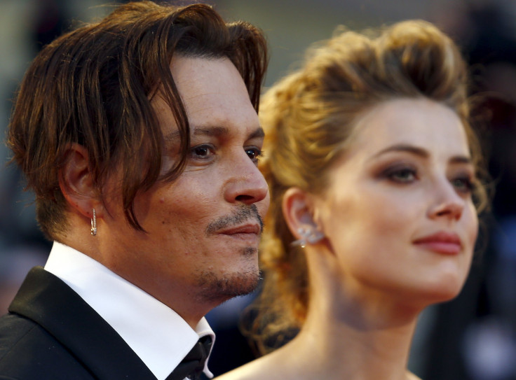 Actress Amber Heard and her husband Johnny Depp