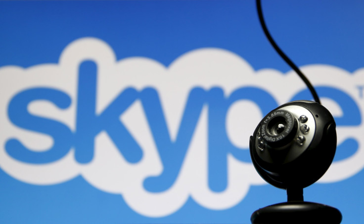 A web camera is seen in front of a Skype logo in this photo illustration taken in Zenica, May 26, 2015. 