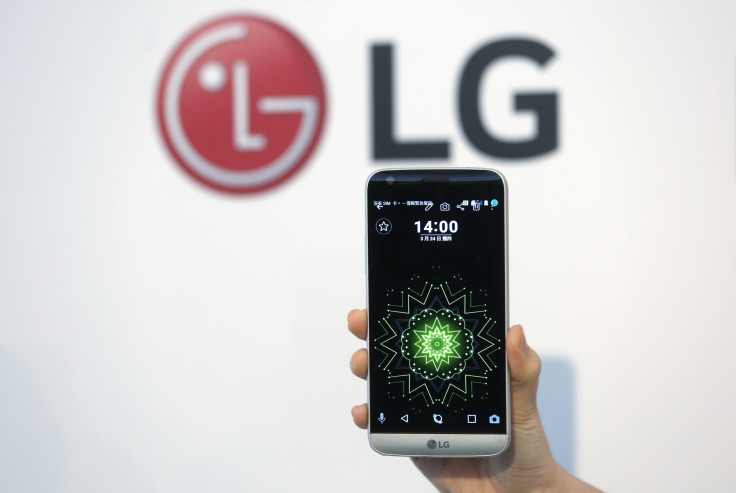 A model poses for photographs with LG Electronics' new smartphone G5 during its launch event in Taipei, Taiwan March 24, 2016. 