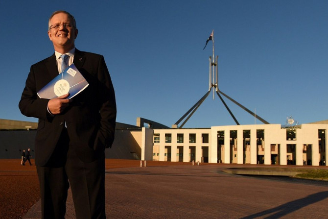 Australian Federal Treasurer Scott Morrison stands outside Australia's Parliament House in Canberra May 4, 2016 following the announcement  Australia's 2016-17 Federal Budget.