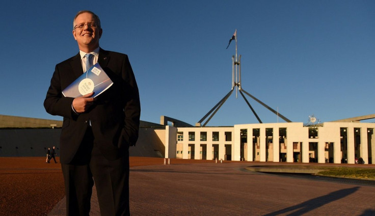 Australian Federal Treasurer Scott Morrison stands outside Australia's Parliament House in Canberra May 4, 2016 following the announcement  Australia's 2016-17 Federal Budget.