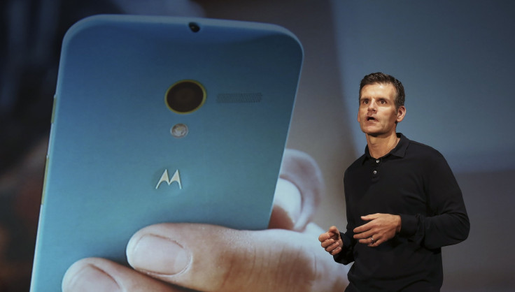 Motorola Mobility Chief Executive Dennis Woodside talks during the worldwide presentation of the Moto G mobile phone in Sao Paulo November 13, 2013. 