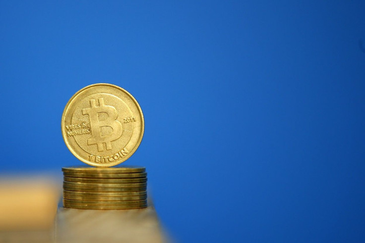 Bitcoin (virtual currency) coins are seen in an illustration picture taken at La Maison du Bitcoin in Paris July 11, 2014.