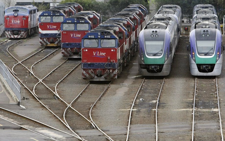 Passenger and goods train engines park in a rail yard in Melbourne June 24, 2008.