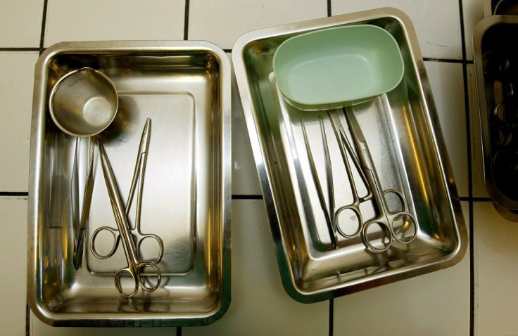 Medical illustration: Washed surgical instruments ready to be packed prior sterilization in Arpajon hospital, March 2003.