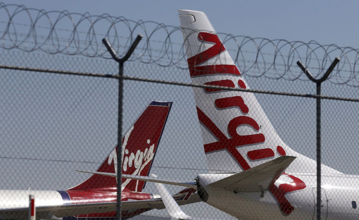 Virgin planes are parked next to each other at Kingsford Smith airport in Sydney in this August 30, 2013 file photo.