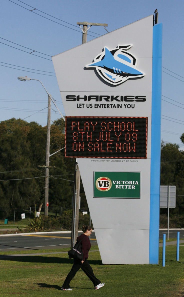 A woman arrives at the Rugby League team 'Sharks' stadium in south Sydney May 15, 2009.