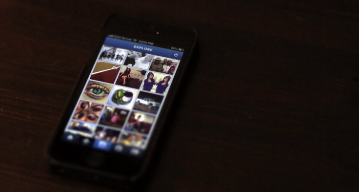 A most popular Instagram page is displayed on a mobile device screen in Pasadena, California August 14, 2013.