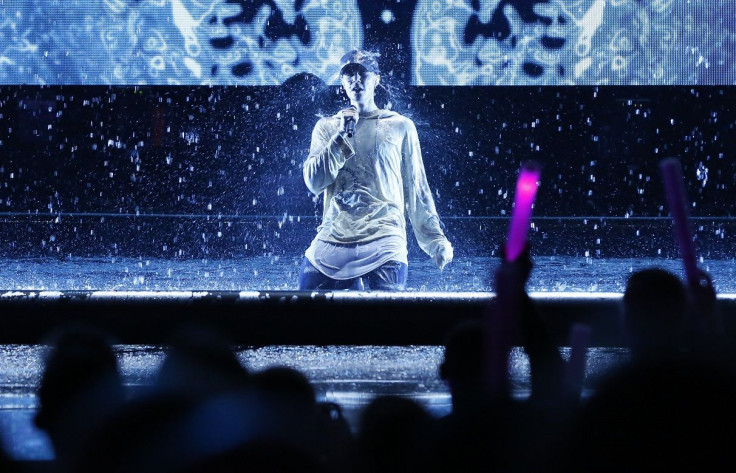 Justin Bieber is drenched with water after he performed "Sorry" during the 2015 American Music Awards in Los Angeles, California November 22, 2015.