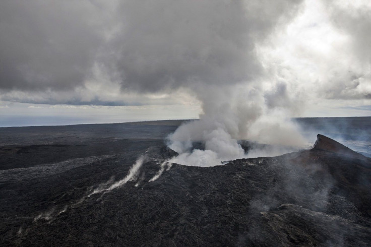 Smoke rises from the  Pu'u O'o vent on the Kilauea Volcano October 29, 2014 on the Big Island of Hawaii.