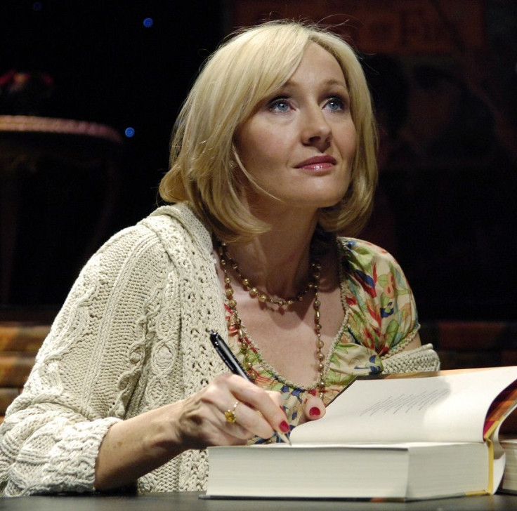 Author J.K. Rowling signs copies of her seventh and final Harry Potter book, "Harry Potter and the Deathly Hallows", during an open book tour stop at the Kodak Theater in Los Angeles October 15, 2007.