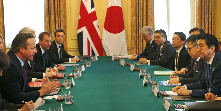 Britain's Prime Minister David Cameron, left, speaks to Japan's Prime Minister Shinzo Abe as they meet at 10 Downing Street in London, Britain Thursday, May 5, 2016.