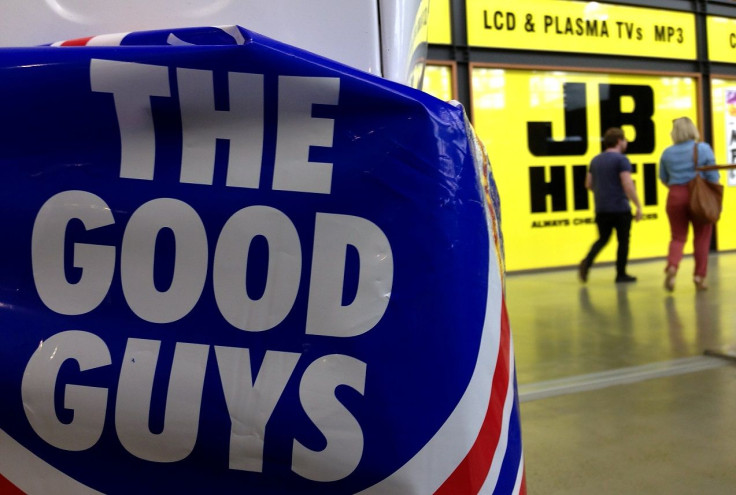 Shoppers walk past stores of Australian electronic goods retailers JB Hi-Fi and the privately-held 100-store rival The Good Guys located in a shopping center in Sydney, Australia, May 19, 2016.