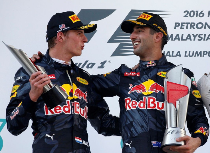 Formula One - F1 - Malaysia Grand Prix - Sepang, Malaysia- 2/10/16  Red Bull's Daniel Ricciardo of Australia celebrates with Red Bull's Max Verstappen of the Netherlands on the podium.