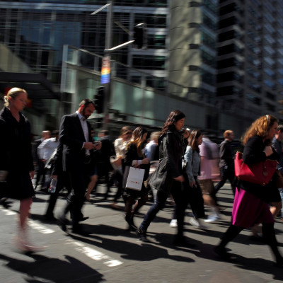Office workers and shoppers walk through Sydney's central business district in Australia, September 7, 2016.