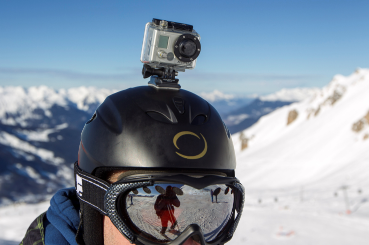 A GoPro camera is seen on a skier's helmet as he rides down the slopes in the ski resort of Meribel, French Alps, January 7, 2014. 