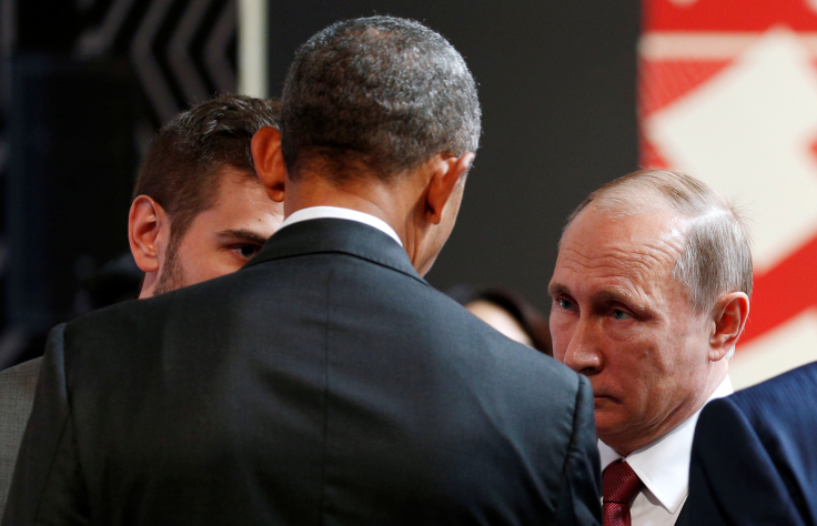 U.S. President Barack Obama talks with Russian President Vladimir Putin at the APEC Economic Leaders’ Meeting in Lima, Peru November 20, 2016.