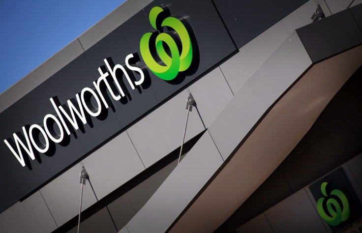 A Woolworths sign adorns the front of a supermarket store in Sydney August 28, 2013.
