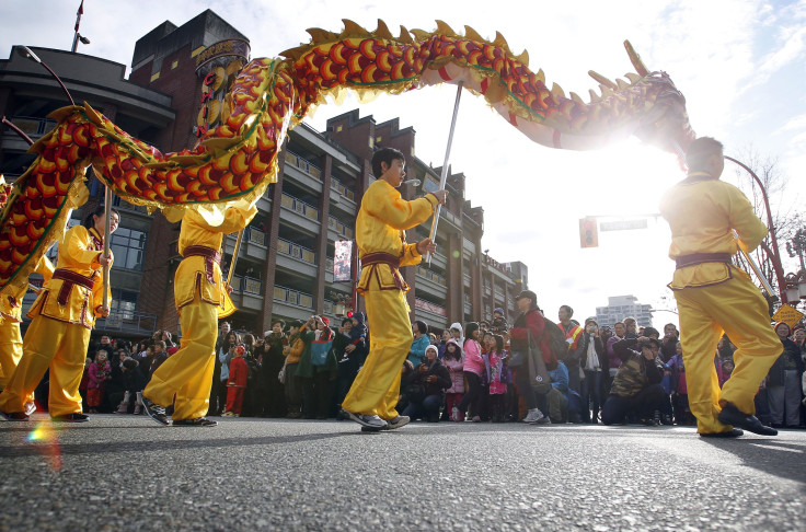 Traditional Chinese dancers perform during the Chinese New Year parade in Vancouver, British Columbia February 2, 2014. 