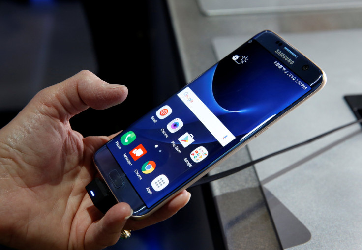 A Samsung S7 Edge Blue Coral smartphone is displayed during the 2017 CES in Las Vegas, Nevada