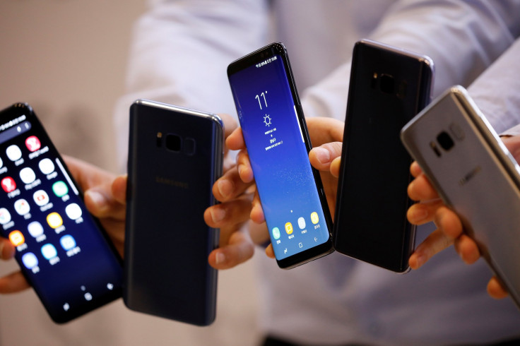 Models pose with Samsung Electronics' Galaxy S8 smartphones during a media event at a company's building in Seoul, South Korea, April 13, 2017.