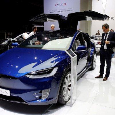FILE PHOTO: The Tesla Model X car is displayed on media day at the Paris auto show, in Paris, France, September 29, 2016.