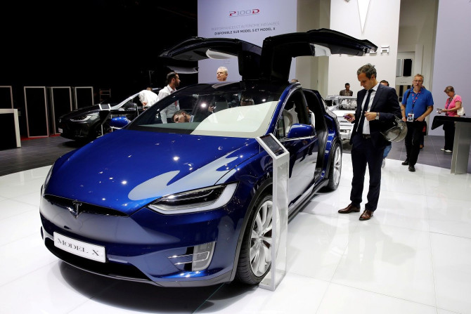 FILE PHOTO: The Tesla Model X car is displayed on media day at the Paris auto show, in Paris, France, September 29, 2016.
