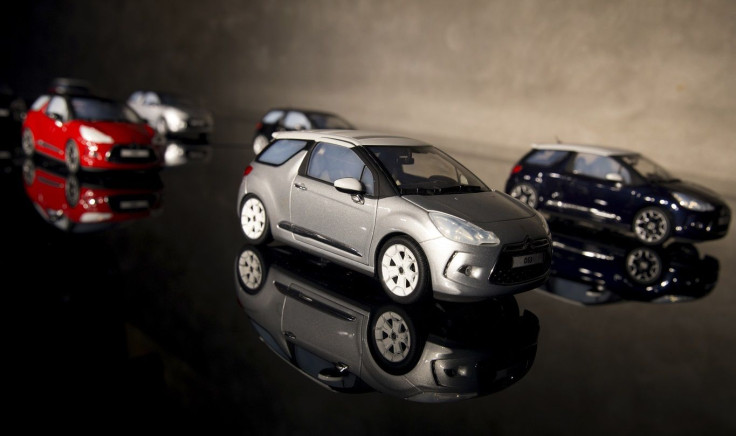Miniature Citroen DS3 toy car models are on display at French carmaker Citroen's DS WORLD store in Paris December 16, 2014.