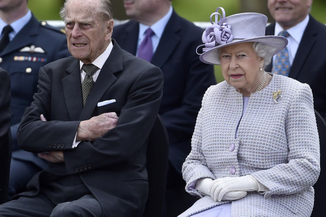 Britain's Queen Elizabeth sits with Prince Philip during a visit to Whipsnade Zoo where she opened the new Centre for Elephant Care, in Dunstable, Britain April 11, 2017.