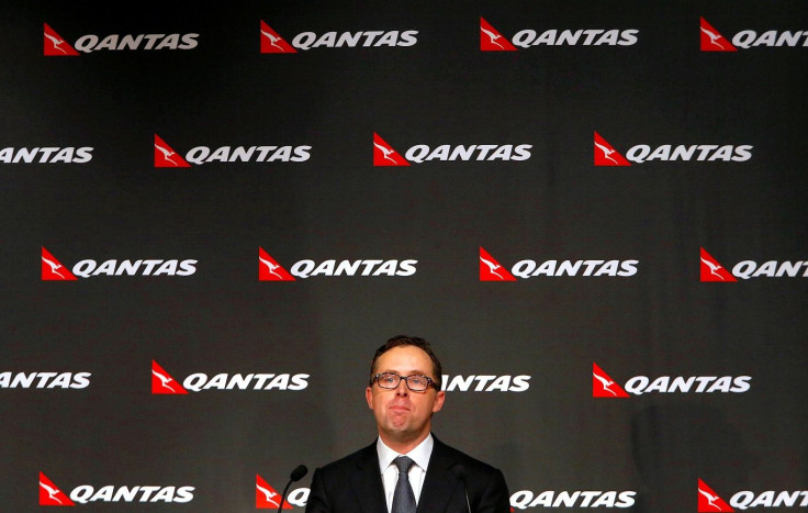 Qantas Airways Ltd Chief Executive Alan Joyce reacts during a media conference in Sydney August 28, 2014.
