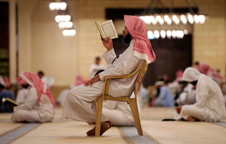 A man reads the Koran in a mosque during the fasting month of Ramadan, in Riyadh, Saudi Arabia, May 29, 2017.