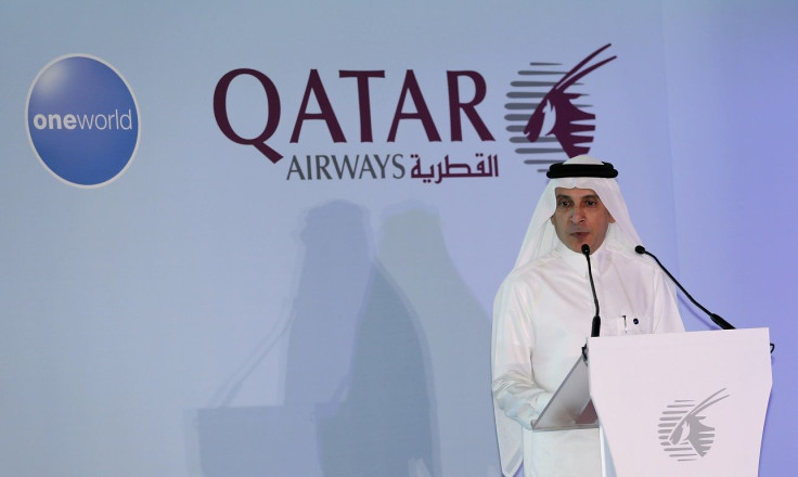 Chief Executive of Qatar Airways Akbar al-Baker announces the airline's participation in the oneworld program, at the Hamad International airport in Doha, October 29, 2013.