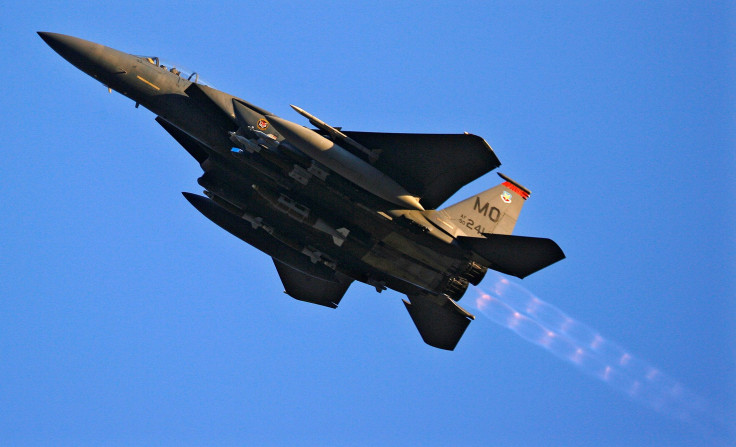 FILE PHOTO: A U.S. Air Force F-15 fighter jet does a low-level flyby over Forward Operating Base Bostick in eastern Afghanistan January 1, 2009.