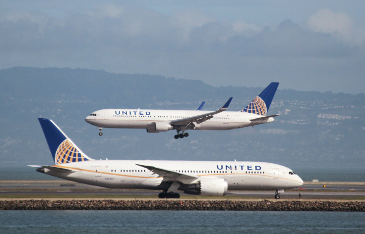 A United Airlines Boeing 787 taxis as a United Airlines Boeing 767 lands at San Francisco International Airport, San Francisco, California, February 7, 2015.