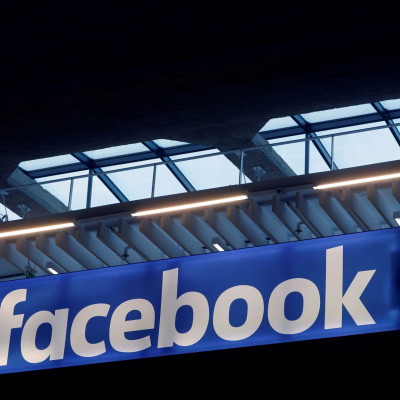 FILE PHOTO: Facebook logo is seen at a start-up companies gathering at Paris' Station F in Paris, France, January 17, 2017.