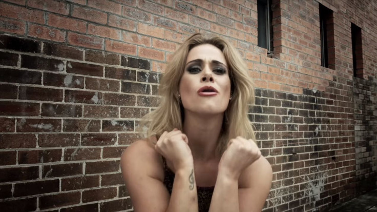 Screenhot of Kate DeAraugo's "Shut Your Mouth" official video