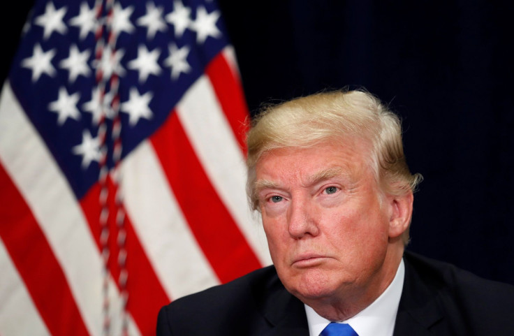 U.S. President Donald Trump listens during a briefing on hurricane Harvey recovery efforts in Dallas, Texas, U.S, October 25, 2017.