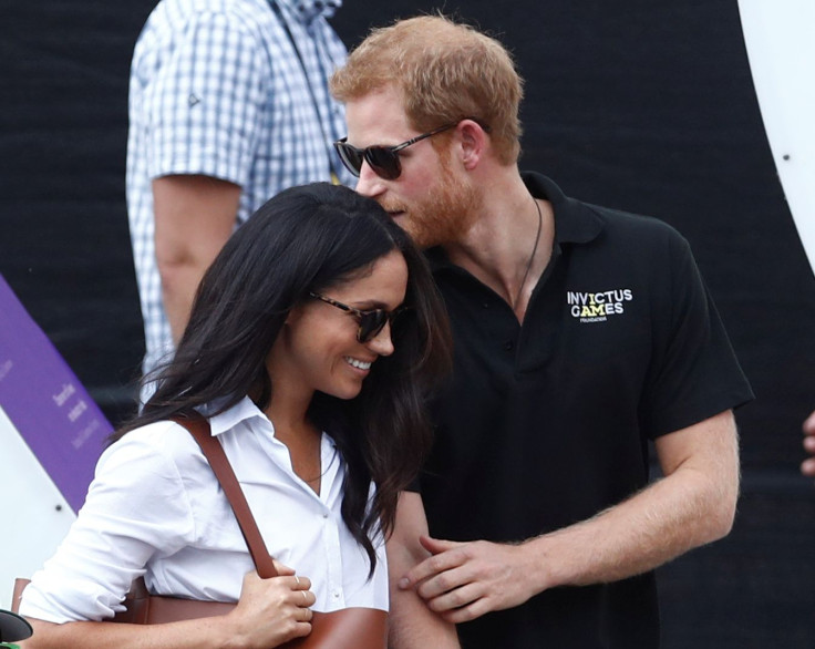 Britain's Prince Harry (R) arrives with girlfriend Meghan Markle at the wheelchair tennis event during the Invictus Games in Toronto, Ontario, Canada September 25, 2017.