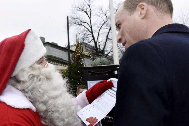 Britain's Prince William, Duke of Cambridge, presents Prince George's handwritten Christmas wish list to Santa Claus