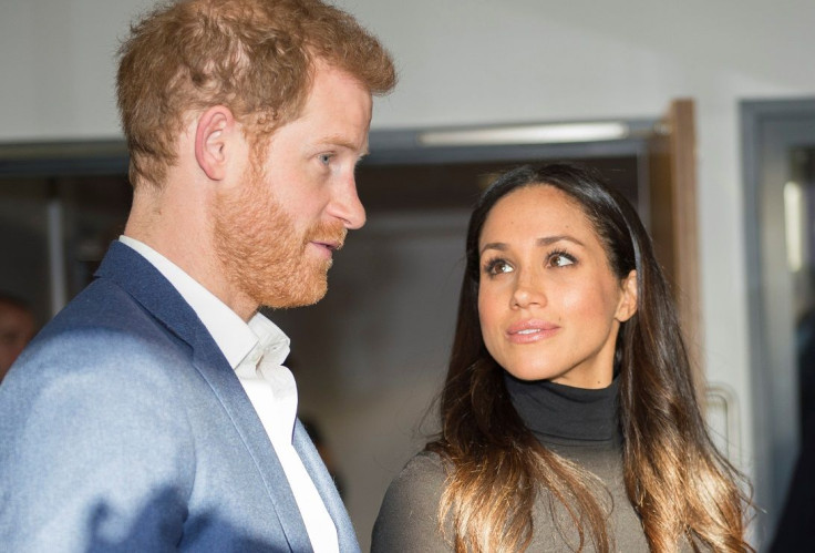 Britain's Prince Harry and his fiancee Meghan Markle visit the Nottingham Academy school in Nottingham, Britain, December 1, 2017.