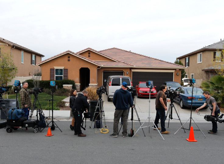 Members of the news media stand outside the home of David Allen Turpin and Louise Ann Turpin in Perris, California, U.S.  January 15, 2018.