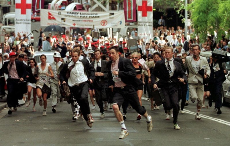Competitors in the annual "Rat Race" leave the start for a three kilometer race through the central business district of Sydney May 2, 1997.
