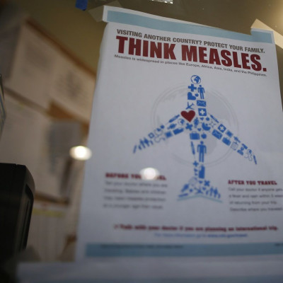 A measles poster is seen at Venice Family Clinic in Los Angeles, California February 5, 2015.