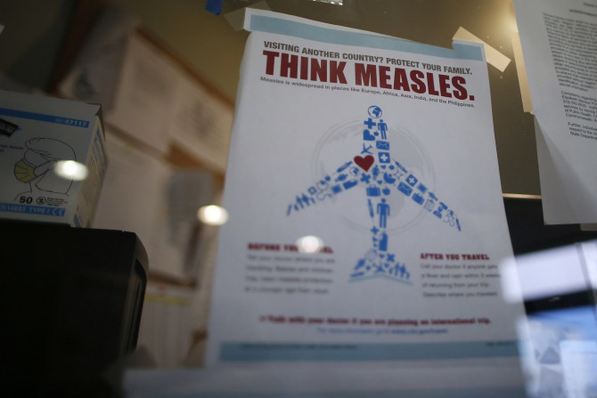A measles poster is seen at Venice Family Clinic in Los Angeles, California February 5, 2015.